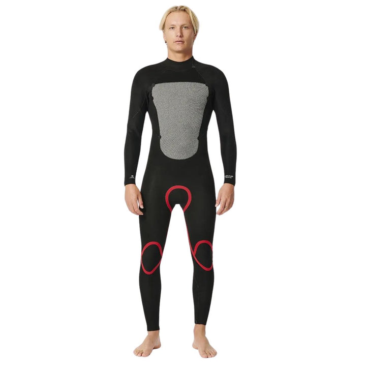 Model wearing Omega 5mm mens wetsuit inside out. Front view.