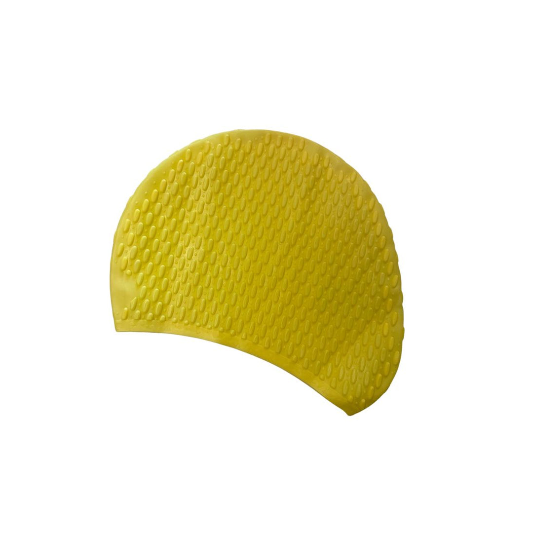 Yellow swim cap with textured surface on a white background