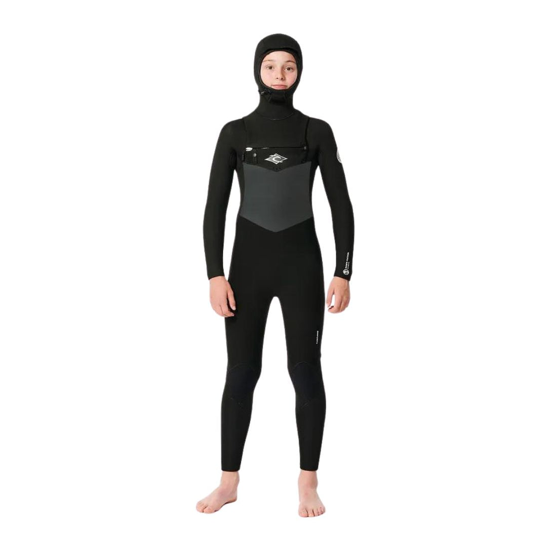 Child model wearing black Rip Curl Dawn Patrol 5/4mm Kids Hooded Wetsuit made from Yulex. Front View. 