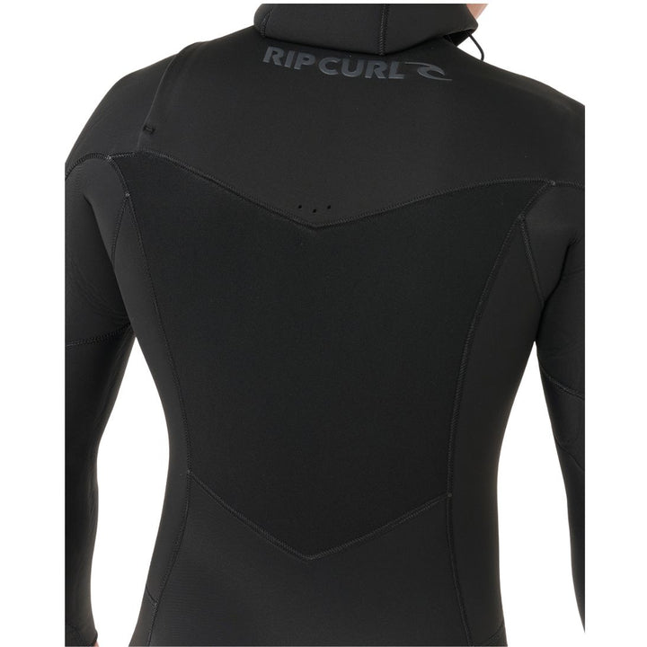 Person wearing a black wetsuit on white background