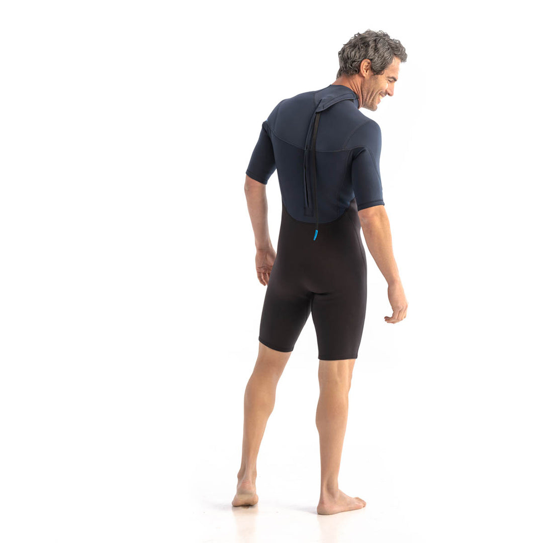 Male model wearing Jobe Perth 3mm Mens Shorty Wetsuit with a back zip entry. View of the back  