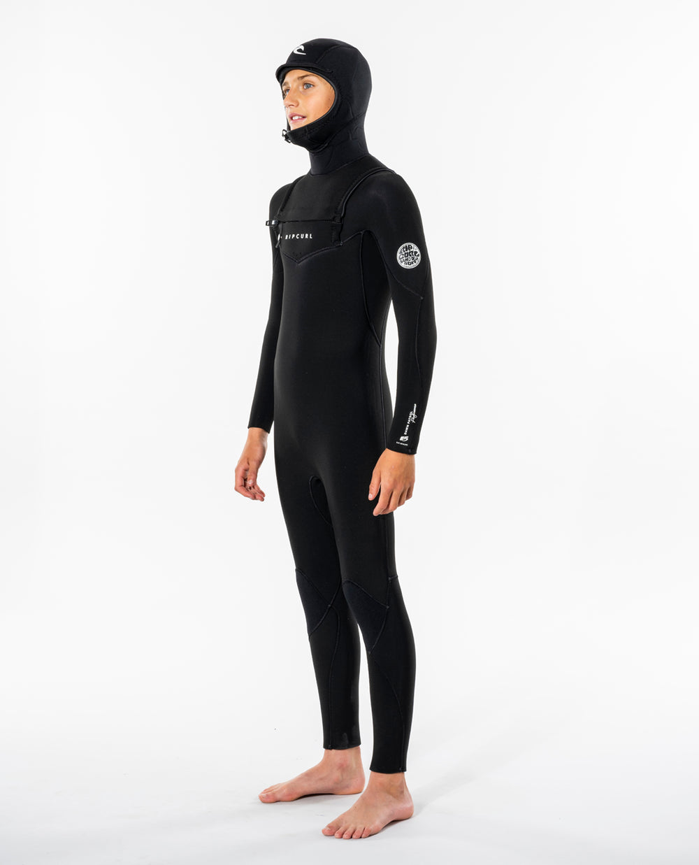 Side view of model wearing black kids hooded wetsuit